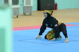 A Malaysian athlete in a performance event of Pencak Silat at the 13th ASEAN Schools Games in Da Nang on June 3. (Photo: VNA)