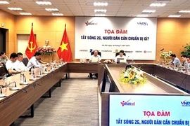 The VietNamNet online newspaper co-ordinated with the Vietnam Telecommunications Authority (VNTA) under the Ministry of Information and Communications to organise a discussion on turning off 2G waves on July 18. (Photo: nld.com.vn)