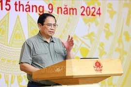 PM Pham Minh Chinh speaks at the conference between permanent Government members and the localities hit by Typhoon Yagi on September 15. (Photo: VNA)