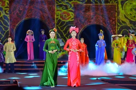 "Ao dai" designs are performed at the opening ceremony of the Hanoi Tourism Ao Dai Festival 2024 on October 4. (Photo: VNA)