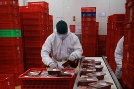 Pork packed at Masan MeatLife, a subsidiary of Masan Group. Several large foreign investment funds are looking to expand investments in Vietnam. (Photot: VNA)