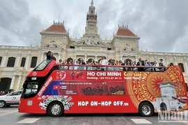Turistas extranjeros en Ciudad Ho Chi Minh. (Fuente:nhandan.vn)