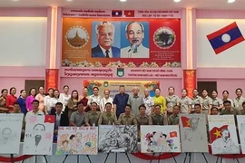 Escuela en Laos rinde homenaje al Presidente Ho Chi Minh. (Fuente:VNA)
