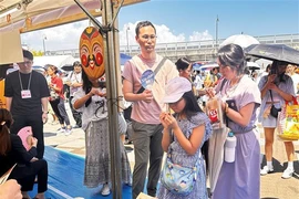 Visitantes japoneses en el Festival. (Fuente:VNA)