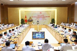 El primer ministro Pham Minh Chinh preside una conferencia para resumir el trabajo de prevención, lucha y superación de las consecuencias de la tormenta Yagi (Fuente: VNA)