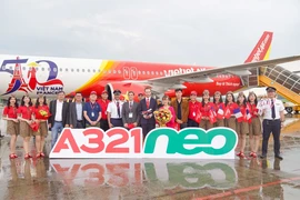 Céréamonie d'accueil d'un nouvel avion de Vietjet à l'aéroport de Tan Son Nhat. Photo: Vietjet