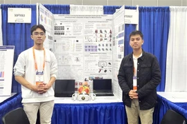 Nguyen Le Quoc Bao and Le Tuan Hy and their project "Integration of Deep Learning into Automatic Volumetric Cardiovascular Dissection and Reconstruction in Simulated 3D Space for Medical Practice" (Photo: VNA)