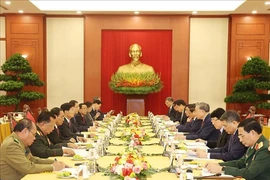 The talks between General Secretary of the LPRP Central Committee and State President Thongloun Sisoulith and his Vietnamese counterpart To Lam (Photo: VNA)