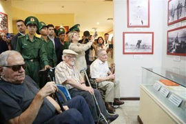 French Secretary of State for Veterans and Memory Patricia Miralles (front row, 3rd from left) and delegates at the Dien Bien Phu Victory museum in Dien Bien province. (Photo: VNA)