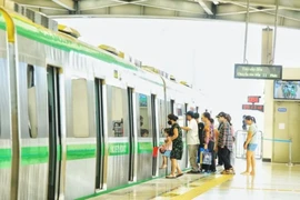Passengers at the Cat Linh–Ha Dong urban metro line. (Photo: VNA)