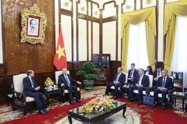President To Lam and Indian Ambassador to Vietnam Sandeep Arya at their meeting in Hanoi on June 26. (Photo: VNA)