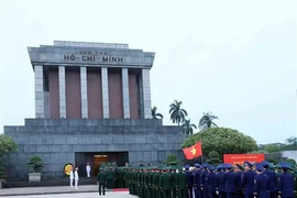 A delegation of the Central Military Commission and the Ministry of National Defence pays tribute to President Ho Chi Minh at his mausoleum in Hanoi on December 14. (Photo: VNA)