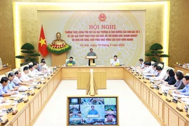 Prime Minister Pham Minh Chinh chairs an online conference of permanent Government members with representatives of localities affected by Typhoon Yagi on September 15 morning. (Photo: VNA)