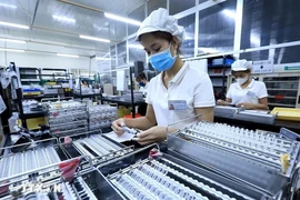 Les IDE au Vietnam dans les industries manufacturières et l’immobilier en forte hausse. Photo: VNA
