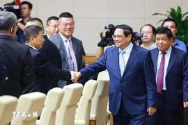 Le Premier ministre Pham Minh Chinh préside un séminaire avec des géants économiques chinois
