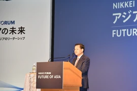 Deputy Prime Minister Le Minh Kha speaks at the forum. (Photo: VNA)