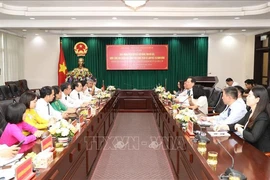 At the working session with Hubei province (Photo: VNA)