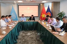 Secretary of the Party Committee of Central Agencies' Bloc Nguyen Van The has a working session with Vietnam’s Permanent Mission to the United Nations (UN) and other representative agencies in New York. (Photo: VNA)