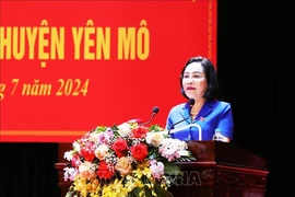 NA Vice Chairwoman Nguyen Thi Thanh speaks at a meeting with voters in Yen Mo district. (Photo: VNA)