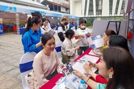 At a festival providing information to students and parents about human resources training in the fields of culture, sports and tourism (Photo: VNA)