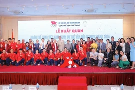 The Vietnamese sporting delegation and delegates at the send-off ceremony in Hanoi on July 17. (Photo: VNA)