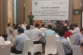 Vietnamese and Irish experts at a conference on capacity enhancement for effective biosecurity strategy for Vietnam held in the Mekong Delta city of Can Tho on July 24. (Photo: nhandan.vn)