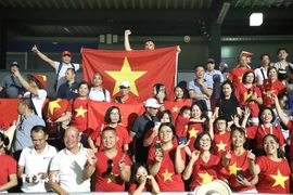 Vietnamese cheerleaders at the match (Photo: VNA)