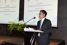 Truong Hung Long, Director of the Department of Debt Management and External Finance under the Ministry of Finance, speaks at the seminar. (Photo: mof.gov.vn)