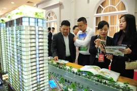 A real estate company introduces a housing project in Hanoi. (Photo: kinhtedothi.vn) 