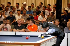 Cho Myung Woo of the Republic of Korea in the final match of the 76th World Championship 3-Cushion Individual. (Photo: VNA).