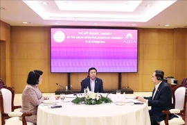 National Assembly Chairman Tran Thanh Man and his counterparts from Laos Saysomphone Phomvihane and Cambodia Khuon Sudary have a working breakfast in Vientiane on October 18 on the occasion of the 45th General Assembly of the AIPA (Photo: VNA)