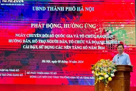 Deputy Chairman of the Hanoi People's Committee Ha Minh Hai speaks at the event. (Photo: VNA)