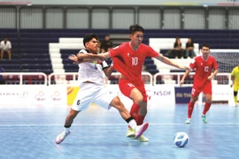 Nguyen Thinh Phat of Vietnam seen in action during the Vietnam vs Timor Leste match of the ASEAN Futsal Championship 2024 on November 2 in Thailand. Vietnam win 4-1 (Photo: VNA)