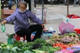 Food prices continue to increase due to the impact of storms and floods. (Photo: VietnamPlus)