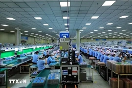 A mobile phone production line (Photo: VNA)