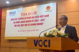 Vice Chairman of the Vietnam Chamber of Commerce and Industry (VCCI) Hoang Quang Phong speaks at the event. (Photo: VNA)