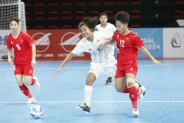 Vietnamese players (in red) seen during their opening match against Myanmar in the ASEAN Women’s Futsal Championship 2024 on November 17 in Manila. Vietnam win 5-2. (Photo: AFF)