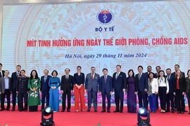 Participants at the event held in response to World AIDS Day (Photo: baochinhphu.vn)