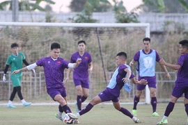 Vietnamese players seen in a training session in Vientiane on December 7. Vietnam will play Laos in the first match of Group B at the 2024 ASEAN Cup on December 9 evening. (Photo: VFF) 