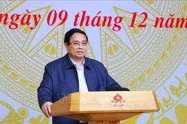 Prime Minister Pham Minh Chinh, who is also Chairman of the Central Emulation and Commendation Council, chairs its 10th meeting Hanoi on December 9. (Photo: VNA)