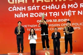 Three delegations - JeongJeom University, Shinhan University, and Daekyung University, all from the Republic of Korea – win top places in civil events at the Vietnam 2024 Asian Open Police Taekwondo Championships. (Photo: VNA)