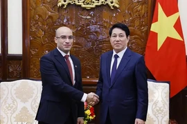 State President Luong Cuong (R) receives Algerian Ambassador to Vietnam Sofiane Chaib. (Photo: VNA)