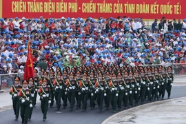 A force joining in the parade marking the 70th anniversary of the Dien Bien Phu Victory at the stadium of Dien Bien province on May 7 morning (Photo: VNA)
