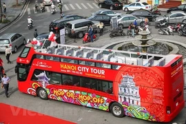 Double-decker bus tour to Bat Trang pottery village
