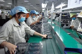 Vietnamese workers' average monthly income rises by 7.4% in H1