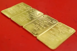 Des lingots d'or de marque SJC seront mis aux enchères le matin du 3 mai (Photo : VNA)
