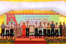 越南政府总理关于将北宁省“桑寺木版”列入国家级宝物名单的决定公布仪式。图自越通社