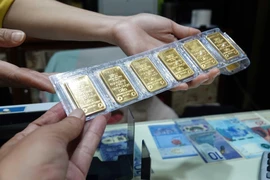 6月25日上午越南国内金价保持7698万越盾/两的价位。图自越通社