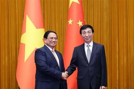  越南政府总理范明政会见中国全国政协主席王沪宁。图自越通社