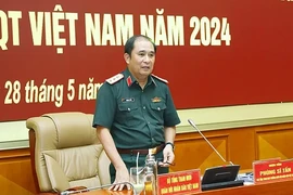  Le général de corps d'armée Phung Si Tân, chef d'État-major général adjoint de l'Armée populaire du Vietnam, à une conférence sur la deuxième Exposition internationale de la défense du Vietnam. Photo: VNA